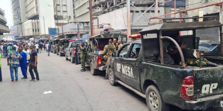 Heavy Security Presence At CBN Lagos Office As INEC Begins Distribution Of Materials